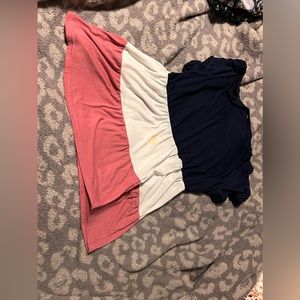 Baby doll shirt. Does have a small stain on the front.